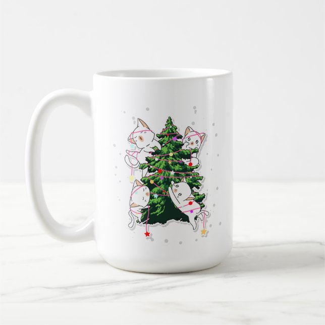 cats climbing and decorating a Christmas tree  Kaffemugg (Vänster)