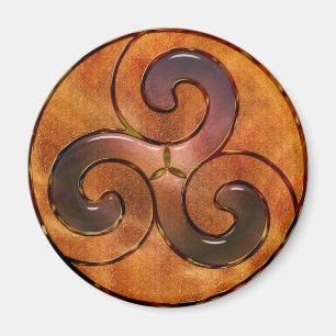 celtic triskele på guld magnet