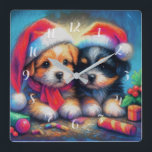 Chalk Drawing Two Cute Puppies in Santa Hats Fyrkantig Klocka<br><div class="desc">Chalk Drawing Two Cute Puppies in Santa Hats Designed by Carrie Fink.  Printed and shipped by Zazzle or their partners.</div>