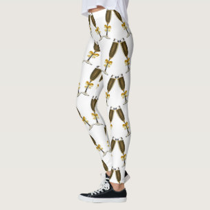 Champagneexponeringsglas med guld- pilbågar leggings