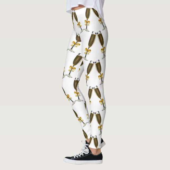 Champagneexponeringsglas med guld- pilbågar leggings (Vänster)