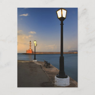 Chania Harbour och Venetian fyr vid solnedgången Vykort