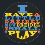 Chanukah/Hanukkah "Dreidel Play..." Stickers Round Runt Klistermärke<br><div class="desc">Chanukah/Hanukkah "Jag har en liten Dreidel.." Stickers Round. Ha roligt att använda de här klisterlapparna som tårtspadar, beställ säckslutningar eller spelar ingen roll sten dina festligheter! Du kan ändra bakgrunden genom att välja ett stort urval av färg. Tack för att du stannade och shoppade förbi! Ditt företag är mycket uppskattat!...</div>