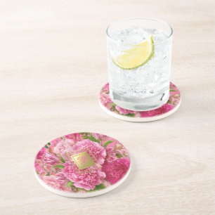 Charmig rosa och grön blomsterinitial sandsten underlägg