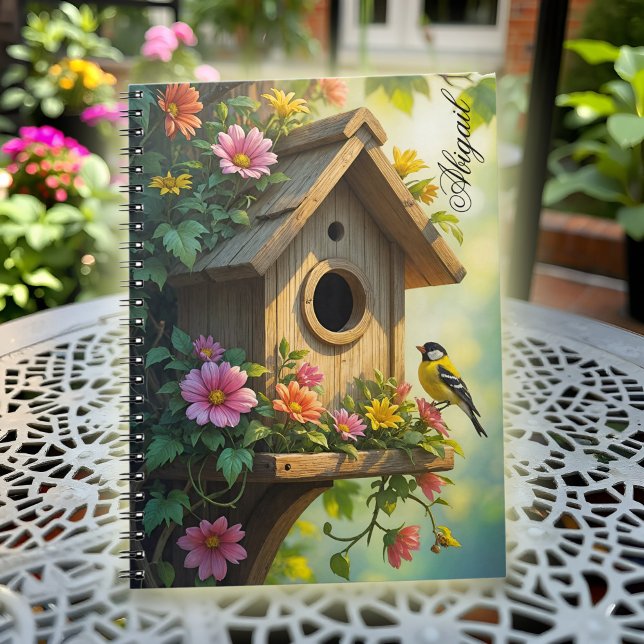 Charming Birdhouse Vibrant Sommfärblomma Underbar  Anteckningsbok (Charming birdhouse notebook with vibrant flowers and a sweet great tit, bathed in warm light.)