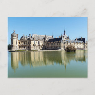 Chateau de Chantilly med eftertanke i sjö Vykort