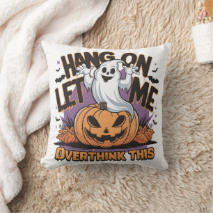 Cheerful Halloween-spökslinga upp en kardad pumpa Kudde