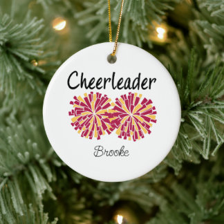 Cheerleader med vinröda och gula/guldfärgade pom-p julgransprydnad keramik