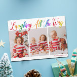Cheerous Rainbow jul 3 Photo Magnet Card<br><div class="desc">Vackra,  färgstarka 3-fotojulkort med Laughing All Way i söt regn kursivt skript. Anpassa dina tre favoritfamiljefotografier av dina leende lodräna ovanför ditt namn eller anpassningsbar hälsning i rött. Roligt och magnetkort med heliga helgdag.</div>