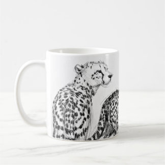 Cheetahs på den automatiskt linjeskiftsvarten & kaffemugg