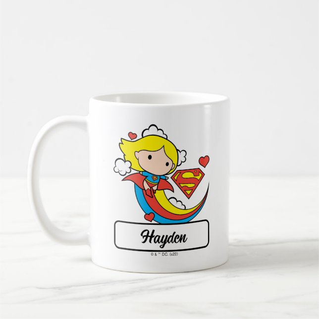 Chibi Supergirl Flying Rainbow Kaffemugg (Vänster)