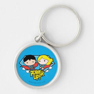 Chibi Superman och Chibi Supergirl Power Up! Rund Silverfärgad Nyckelring