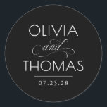 Chic Modern Minimalist Typography Black Wedding Runt Klistermärke<br><div class="desc">Minimalist black wedding seals place the couple’s names front and center — boldly presented and elegantly connected by a calligraphic “and” that adds a graceful,  romantic flourish.

Fully customizable to reflect your unique style — with adjustable text and background colors to perfectly complement your wedding aesthetic.</div>
