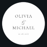 Chic Script Minimalist Wedding Runt Klistermärke<br><div class="desc">Add a personal and elegant touch to your wedding favors, envelopes, or packaging with this minimalist round sticker featuring your custom name in a graceful script font. Designed to complement a modern and timeless wedding theme, this classic black-and-white design pairs beautifully with any part of your celebration. Perfect for sealing...</div>