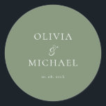 Chic Script Sage Green Minimalist Wedding Runt Klistermärke<br><div class="desc">Add a personal and elegant touch to your wedding favors, envelopes, or packaging with this minimalist round sticker featuring your custom name in a graceful script font. Designed to complement a modern and timeless wedding theme, this classic Sage Green and white design pairs beautifully with any part of your celebration....</div>