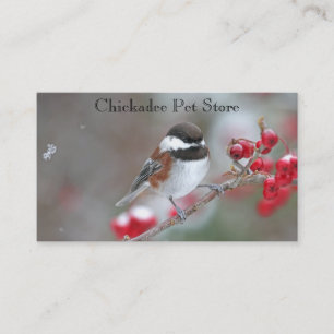 Chickadee i fallande snö med röda bär visitkort