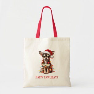 Chihuahua-Hund som är snurrig i ljus under jul Tygkasse