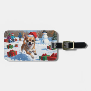 Chihuahua löper i snö med julhatt bagagebricka