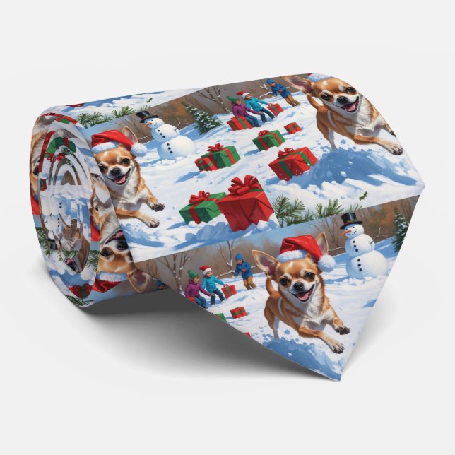 Chihuahua springer i snö med julhatt slips (Rullad)