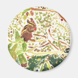 Chipmunk som äter en bärmagnet magnet