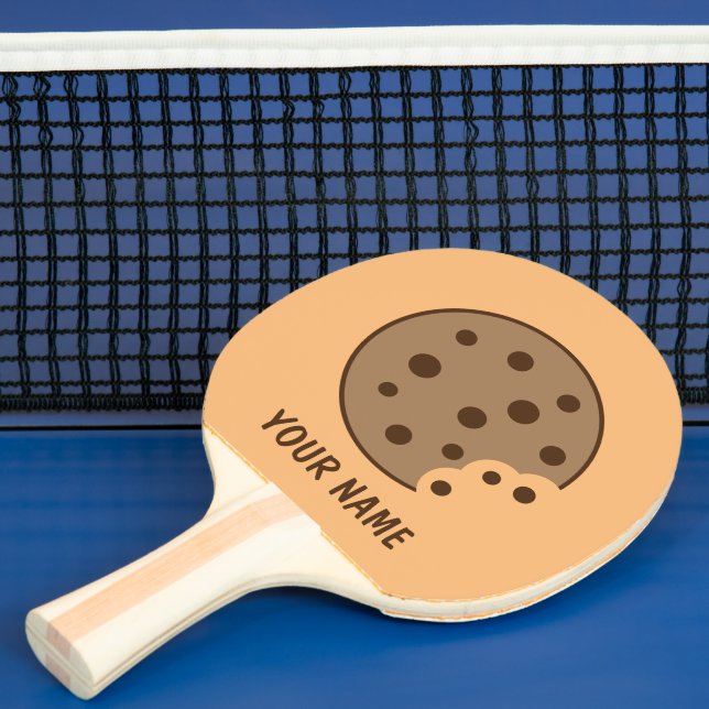Chocolate chip cookie bord tennis-match pingisracket (Insitu)