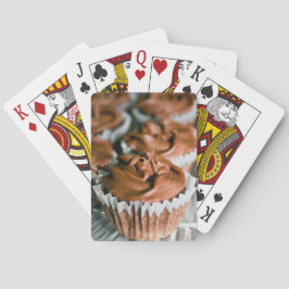 Choklad Frosted-Muffinsar på ett plåt-foto Spelkort