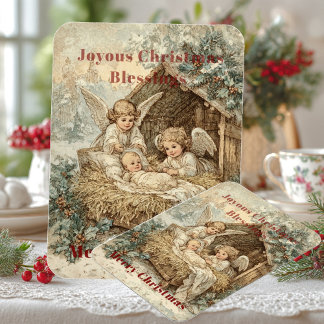 Christmas card with baby Jesus in a manger and ang Magnet