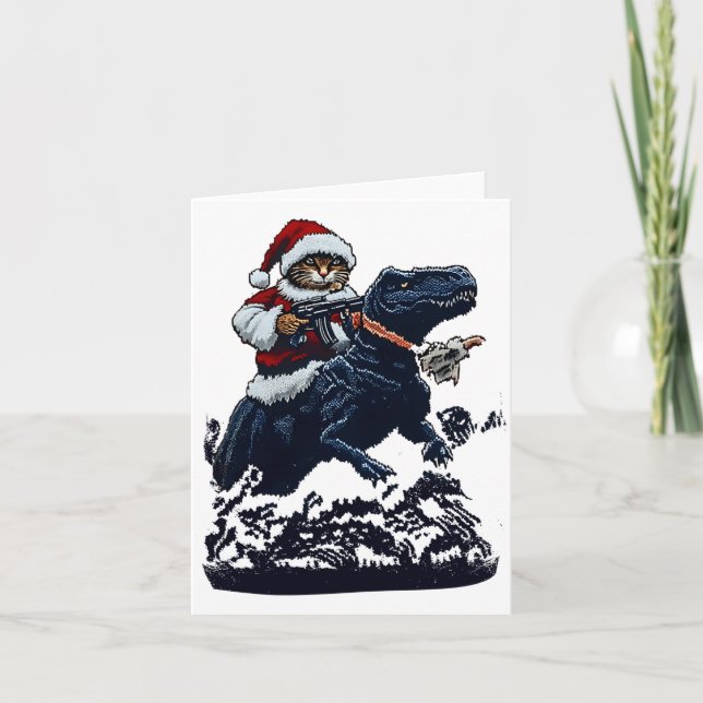 Christmas Cat In Santa Hat Holding A Gun And Dinos Kort (Framsida)
