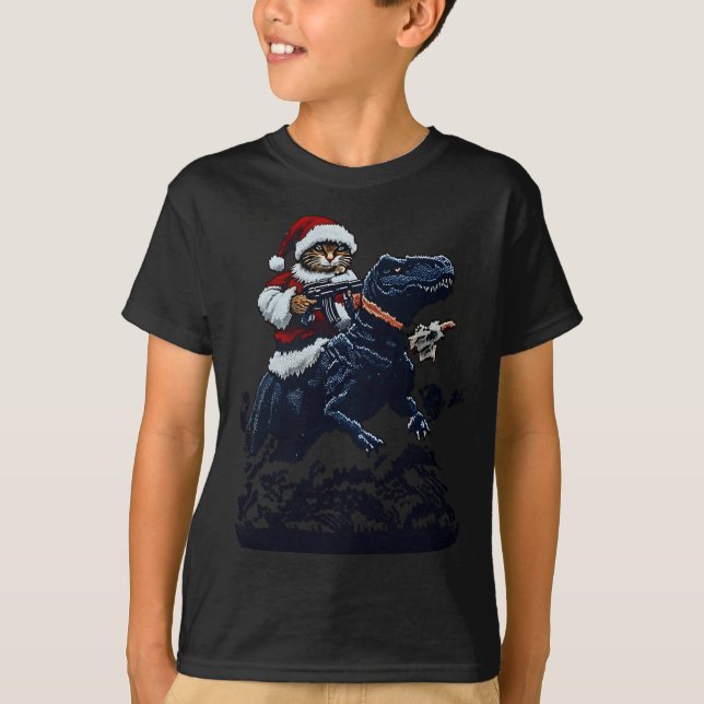 Christmas Cat In Santa Hat Holding A Gun And Dinos T Shirt (Framsida)