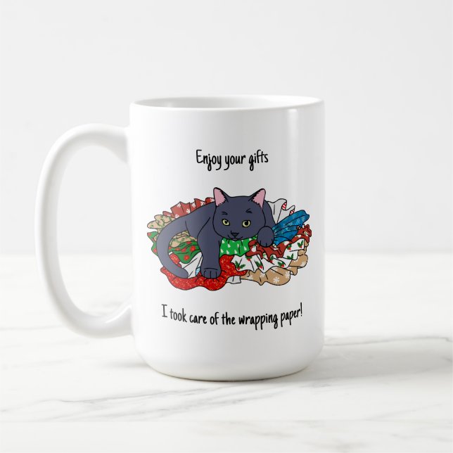 Christmas cat with wrapping paper kaffemugg (Vänster)