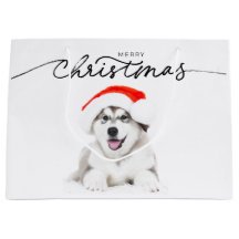 CHRISTMAS GIFT BAG MED HUSKY PUPPY I SANTA HAT