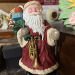 Christmas Greeting Card with Santa Kort<br><div class="desc">I bought this Santa online and he's beautifully dressed and adorned with a staff and wrapped presents. He makes and unusual Christmas card with his dynamic eyes!</div>