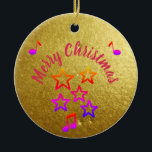 Christmas in Music Julgransprydnad Keramik<br><div class="desc">This sparkling Christmas ornament brings a joyful and festive touch to your tree. Its glittery gold surface highlights the Merry Christmas message, surrounded by colorful stars and musical notes that capture the magic of the holiday season. Hanging from a branch, it adds warmth, charm, and a musical glow to your...</div>