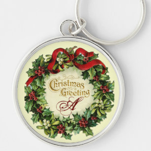 CHRISTMAS KRONA MED MISTLETOES OCH HOLLY BERRIES RUND SILVERFÄRGAD NYCKELRING