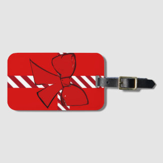 Christmas luggage tag in red and candy cane ribbon bagagebricka