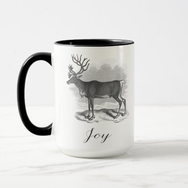 Christmas mug with antique deer etching says Joy Mugg (Vänster)