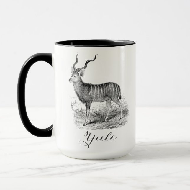 Christmas mug with antique deer etching says Yule. Mugg (Vänster)