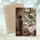 Christmas Tree Lights Julkort<br><div class="desc">An illustration of a little boy in a Santa hat standing in awe of a beautiful Christmas tree and presents features a Believe greeting on the front and your personalized message and names on the back.</div>