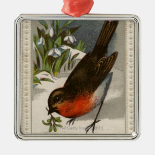 Circa 1871: A robin, med mistletoe i dess skak Julgransprydnad Metall