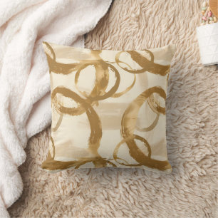 Cirkelformer i guld kudde