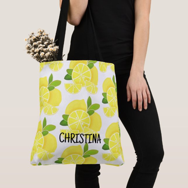 Citroncitroner, citronskivor, tropiska gulter tygkasse (Närbild)