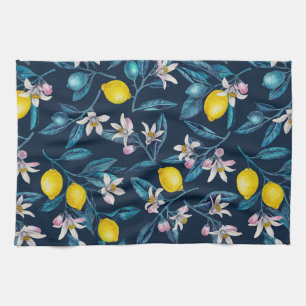 Citrongrenar med blommor och frukt på blått kökshandduk