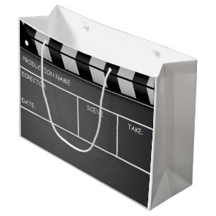 Clapperboard hänger lös den stora gåvan