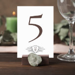 Classic Wedding Reception Table Number Card Bordsnummer<br><div class="desc">Add a refined touch to your reception tables with this elegant wedding table number sign featuring a classic monogram crest. The design pairs a large, graceful table number with a delicate botanical crest monogram beneath it, creating a sophisticated and balanced layout that complements formal and romantic wedding décor. The minimalist...</div>