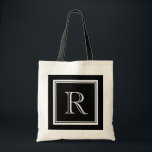 Classy luxury style monogram wedding tote bag tygkasse<br><div class="desc">Classy luxury style monogram wedding tote bag. Cute bags for bride, bridesmaid, maid of honor, flower girl, mother of the bride etc. Stylish border with pretty name initial letter in the middle. Chic luxurious typography. Customizable background color. ie black and white. Great for beautiful wedding, bridal party, bachelorette, girls weekend,...</div>