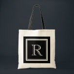 Classy luxury style monogram wedding tote bag tygkasse<br><div class="desc">Classy luxury style monogram wedding tote bag. Cute bags for bride, bridesmaid, maid of honor, flower girl, mother of the bride etc. Stylish border with pretty name initial letter in the middle. Chic luxurious typography. Customizable background color. ie black and white. Great for beautiful wedding, bridal party, bachelorette, girls weekend,...</div>