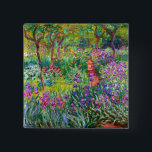 Claude Monet: Iris Garden at Giverny Knapp<br><div class="desc">En färgstark klassisk knapp med iris-trädgården i Giverny,  målad av den Fransk imponerande målaren Claude Monet.</div>