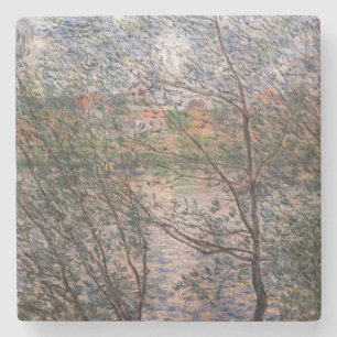 Claude Monet - Springtime genom grenar Stenunderlägg