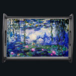 Claude Monet-Vatten-Liljar Frukostbricka<br><div class="desc">Konstmästerverk av Claude Monet (1840 - 1926) som presenterar hans populärt,  landskap målningnäckrosor som baseras på styrkor av blått,  grönt och lilor. Det gör ett attraktivt litet portionmagasin för fläktar av Claude Monet.</div>