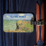 Cliff Walk vid Pourville av Claude Monet Bagagebricka<br><div class="desc">Cliff Walk vid Pourville (1882) av Claude Monet är en vintage bra- konsthantverk nautisk målning. Ett sjölandskap med två kvinnor som står på en klippande havsklipp. Dam bär parasoler och förbiser vågar på havet en solig sommardag. Om konstnären: Claude Monet (1840-1926) var en av grundarna av den Fransk målningsrörelsen och...</div>